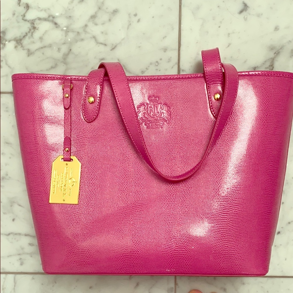 Pink embossed vegan leather tote bag.